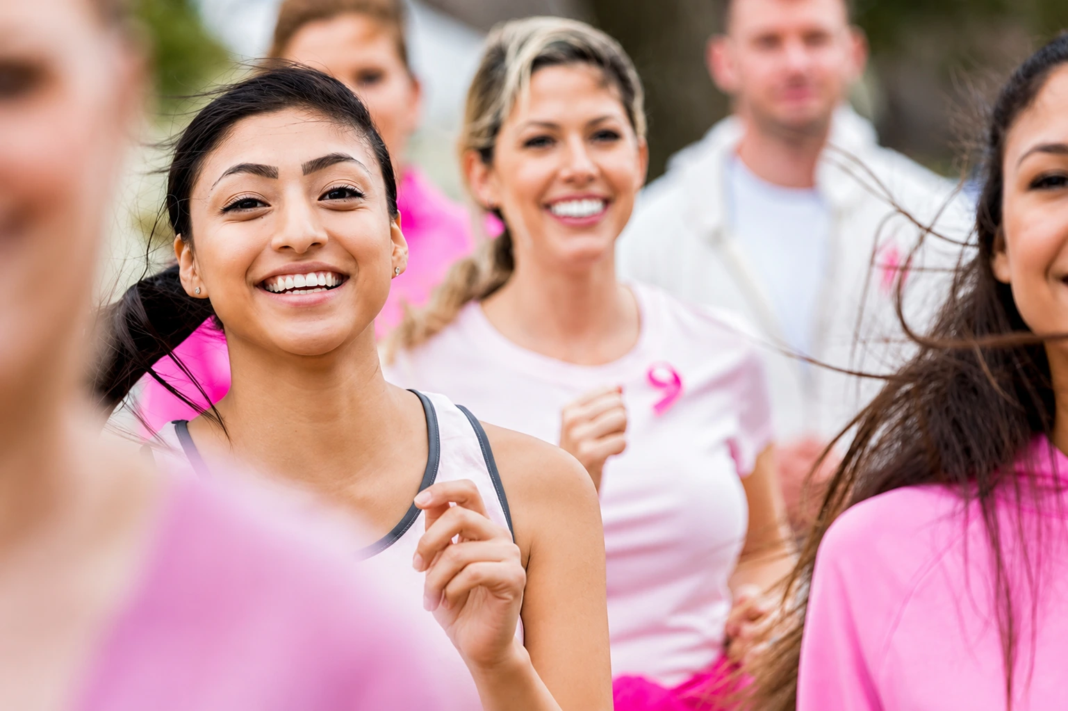 Young women at a breast cancer awareness run